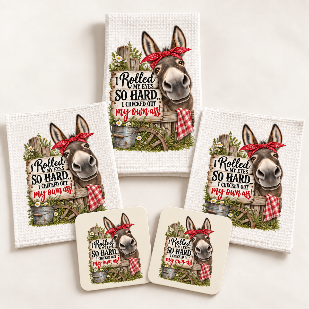 All five pieces of the funny donkey kitchen gift set laid out