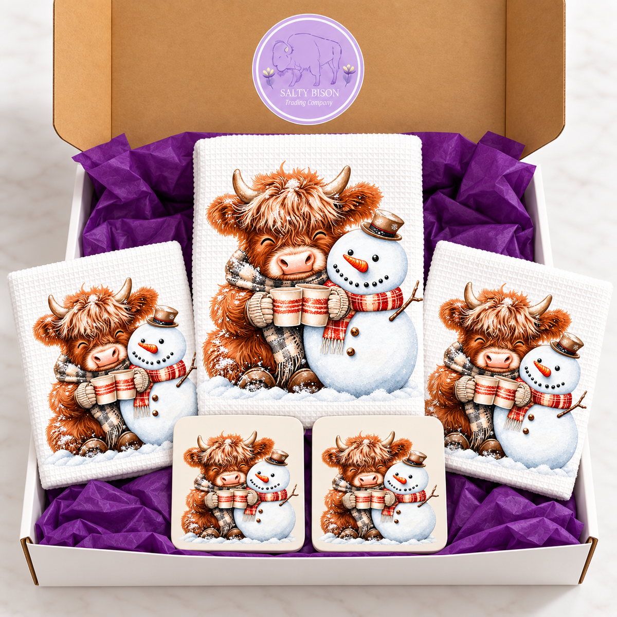 Highland cow and snowman gift set packed in Salty Bison box with purple tissue