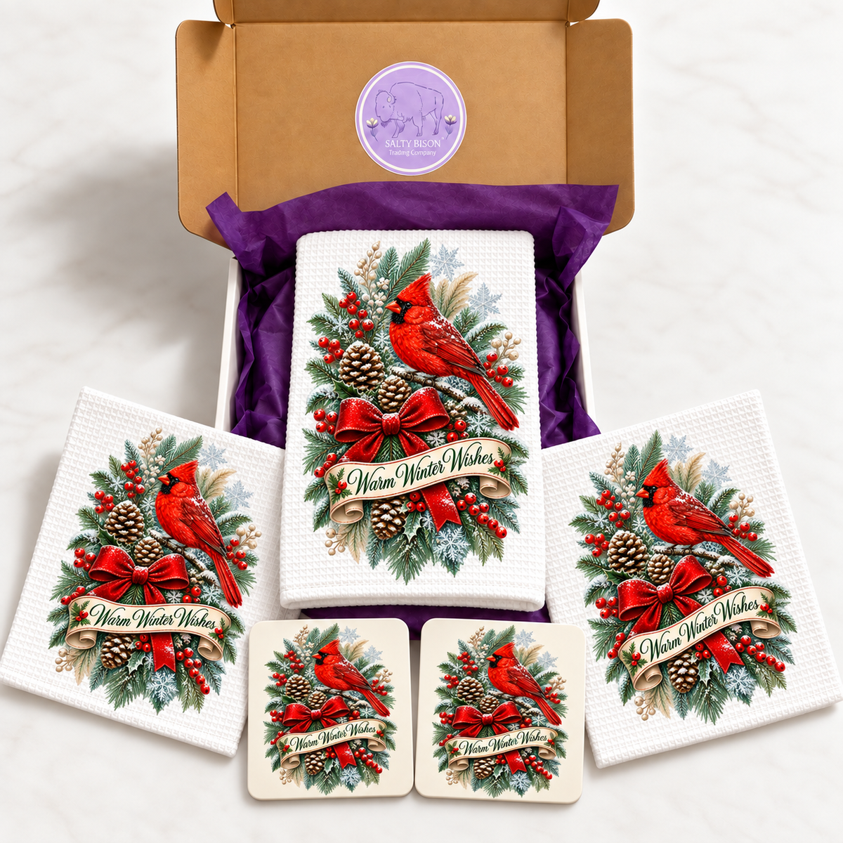 Warm Winter Wishes cardinal kitchen gift set displayed with Salty Bison box